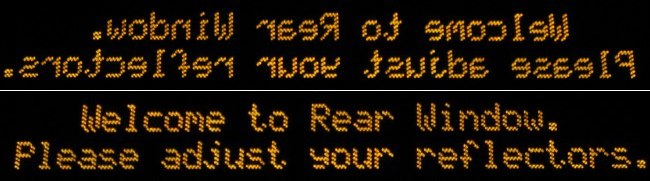 &lsquo;Welcome to Rear Window. Please adjust your reflectors&rsquo; placeholder message in amber LED type