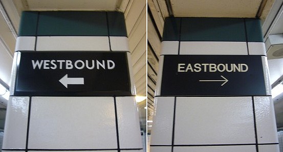 Two columns have signs reading WESTBOUND &larr; and EASTBOUND &rarr; in different fonts