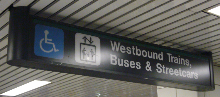 Clearly visible sign with white type on a black background
